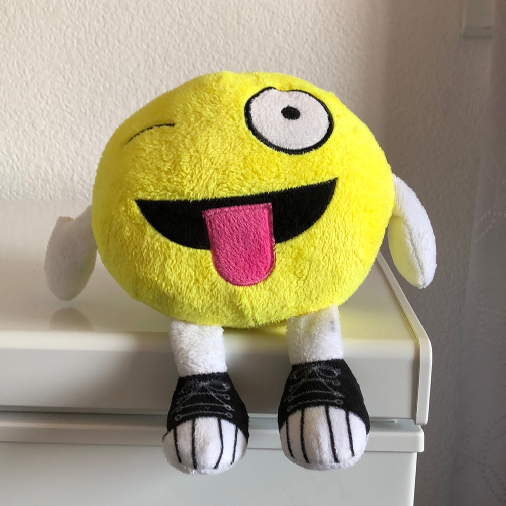 Stuffed Emoji with arms and sneakers. Approximately 10 inches tall